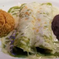 Spinach & Mushroom Enchiladas (3) · Flour tortillas filled with spinach and mushroom, topped with a green chili-spinach cream sa...