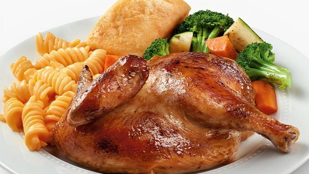 Half Chicken · Farm fresh, never frozen, all natural roasted rotisserie chicken marinated with the perfect blend of garlic, herbs and spices. Served with 2 sides and cornbread.