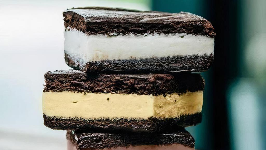 Caramel Salt Lick Sandwich · Salty and sweet make it official! Homemade caramel ice cream is elevated by just a hint of sea salt, then slathered between two soft chocolate cake cookies.