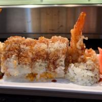 Kemah Krunch Roll · Marinated crab, shrimp tempura, masago caviar rolled with tempura crunchies and topped with ...