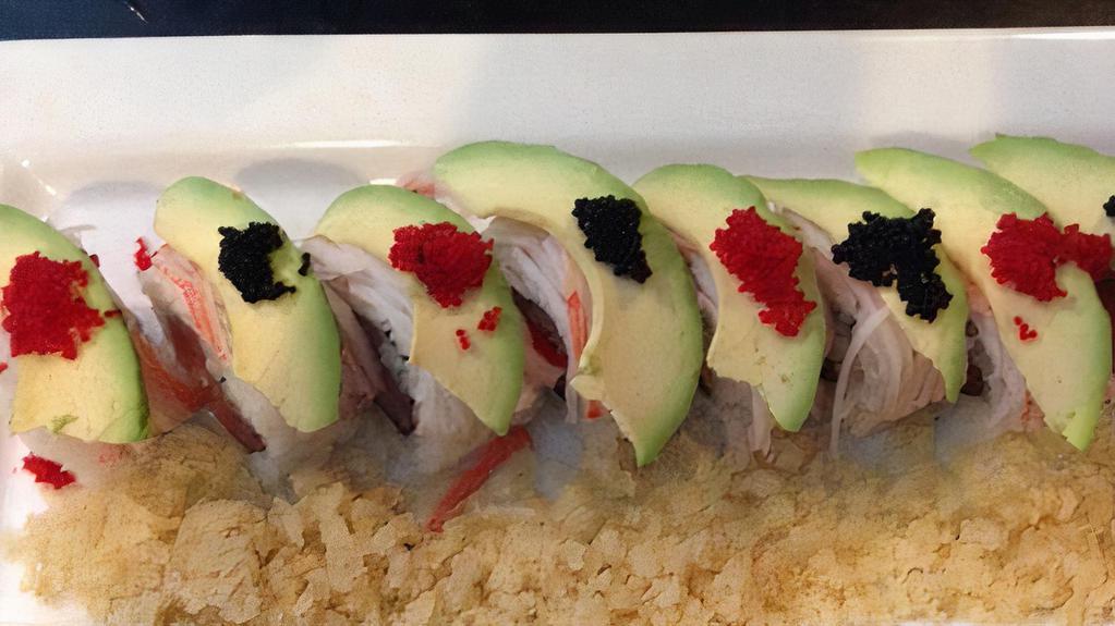 Ninja Roll · Salmon, shrimp tempura, cream cheese, topped with eel, and special sauce.