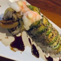 Caterpillar Roll · Ell and rice rolled with paper thin avocado.