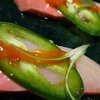 Hamachi-Zu Bites · Slices of Yellowtail Topped w/ Jalepeno, Ponzu Sauce, Sriracha, & Scallions
;Raw