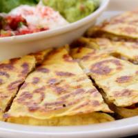 Fajita Quesadillas (Chicken) · 6 Quesadillas filled with Monterey Jack Cheese and tomato, sided with guacamole and sour cre...