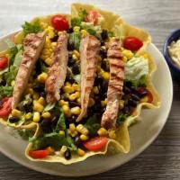 Grilled Fajita Salad-Chicken · Mesquite grilled chicken or steak served in a tortilla shell with lettuce, topped with fresh...