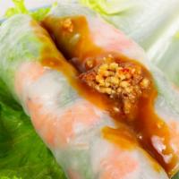 Shrimp Spring Rolls (2) · Shrimp, vermicelli, bean sprouts & lettuce rolled in rice paper & served with peanut sauce. ...