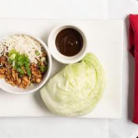 Chicken Lettuce Wraps · Minced water chestnuts, carrots & mushrooms sautéed with chicken or shrimp. served with iceb...
