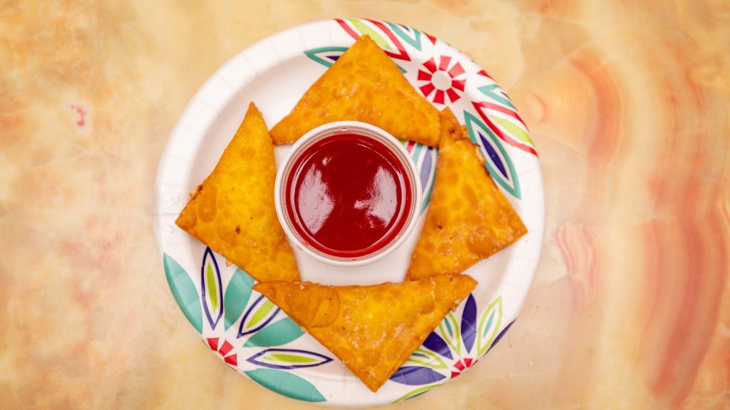 Crab Rangoons · Four pieces. Crispy wonton filled with cream cheese and crab with sweet and sour sauce.