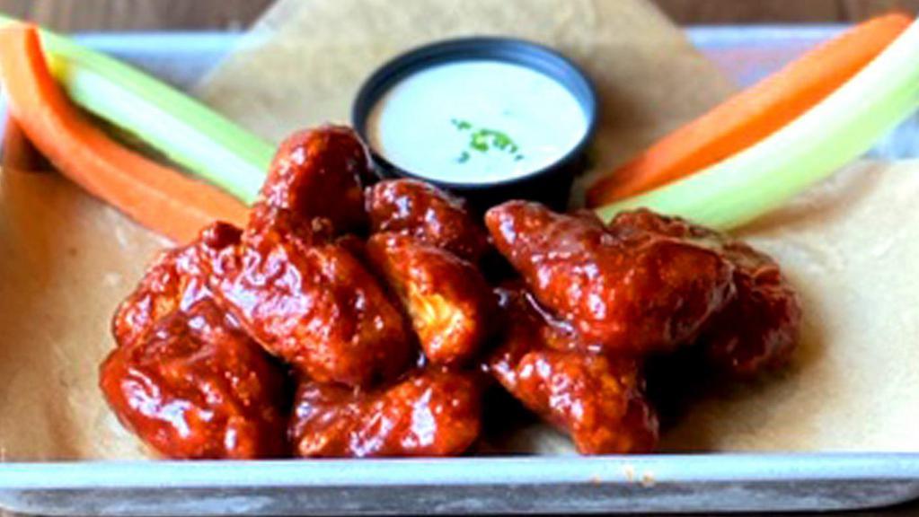Boneless Wings  · Tossed in your choice of Nashville Hot Honey sauce served with celery, carrots and a side of ranch or bleu cheese dressing