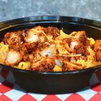 Nashville Hot Mac & Cheese · A blend of creamy mixed cheeses topped with crispy Nashville chicken tenders, and roasted gr...