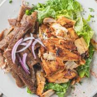 Combo Chicken & Gyro Salad · Greek feta salad served with our homemade dressing, romaine lettuce, feta cheese, Kalamata o...