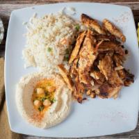 Chicken Shawarma Plate · Roasted chicken breast thinly sliced and marinated with garlic, olive oil & spices. Served w...