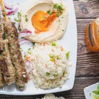 Kafta Kabob · So flavorful and juicy Kabob made with ground beef, minced onions, chopped parsley, and seas...