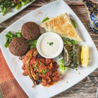 Vegetarian Plate · Pick five delicious fresh made vegetarian options. Served with feta salad and pita bread