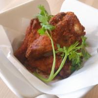 5 Indomitable Chicken Wing Icw · 5 Deep fried chicken wing seasoned with our special curry rub topped with cilantro