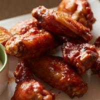 Chicken Wings · Traditional Bone-in Wings tossed in one of your favorite sauces