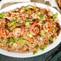 Arroz Chaufa Limeno · Best selling Peruvian-style fried rice with chicken, pork and shrimp.