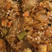 Kimchi Fried Rice · Steamed rice, cabbage, kimchi, onions, zucchini, carrots, mushrooms