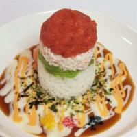 Ahi Tower · Raw. Comprised layer of sushi rice crabmeat, avocado, tobiko, choice of spicy tuna