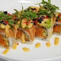 In & Out Salmon Roll · Raw. Spicy. Salmon, avocado on spicy salmon roll with jalapeno, tobiko, cilantro.