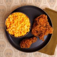 Fried Chicken Dinner · Crispy fried chicken breast and drumstick with your choice of side.