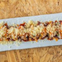 King Shaggy Roll · Shrimp tempura, avocado, cream cheese topped with crab stick, caviar, crunchy flakes, spicy ...