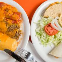 Jimmy'S Special · Chicken Enchilada Topped with Salsa Ranchera, Cheese Taco, Cheese Enchilada Topped with Chil...