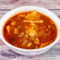 Spicy Tofu Soup 32 Oz · The dish is made with freshly curdled soft tofu, vegetables, and gochujang or gochugaru.