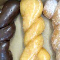 Twist · Choose from our selection of chocolate, cinnamon, glazed, or sugar twist donuts.