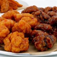Buddy Pack (Feeds 2) With Boneless Or Original Wings  · Boneless or Original wings with your favorite sides, flavors and dips.