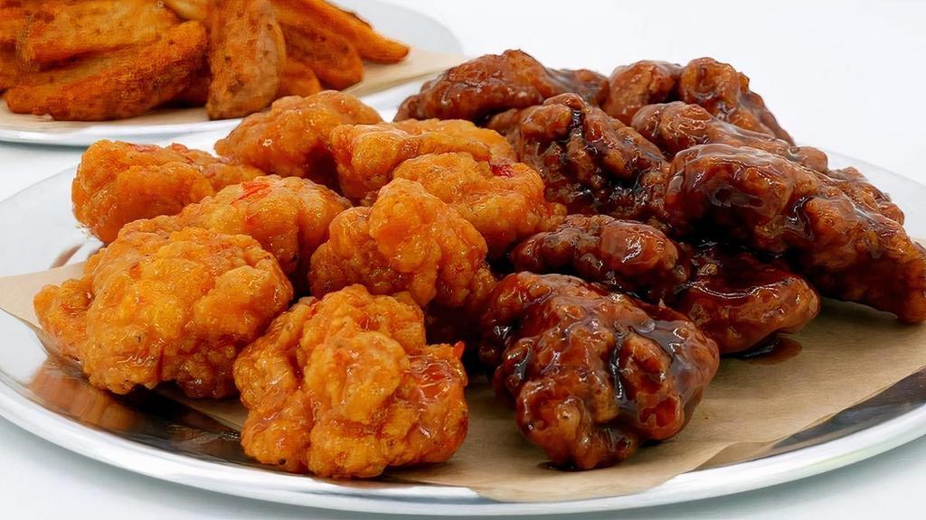 Buddy Pack (Feeds 2) With Boneless Or Original Wings  · Boneless or Original wings with your favorite sides, flavors and dips.