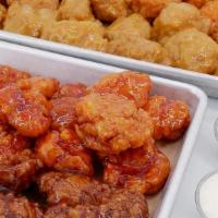 Crew Pack (Feeds 5-6) With Boneless Or Original Wings  · Boneless or Original Wings  with your favorite sides, flavors and dips.