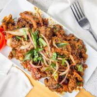 Mutton Sukka · Bone-in goat, cooked with special spices and pepper. Please allow extra time for this item t...