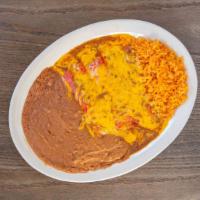 Enchiladas Rojas Plate · Three enchiladas in our homemade gravy and yellow cheese with filling, served with rice, bea...