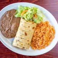 Chimichanga Plate · Chimichanga filled with carne asada meat and white cheese, served with rice, beans, and salad.