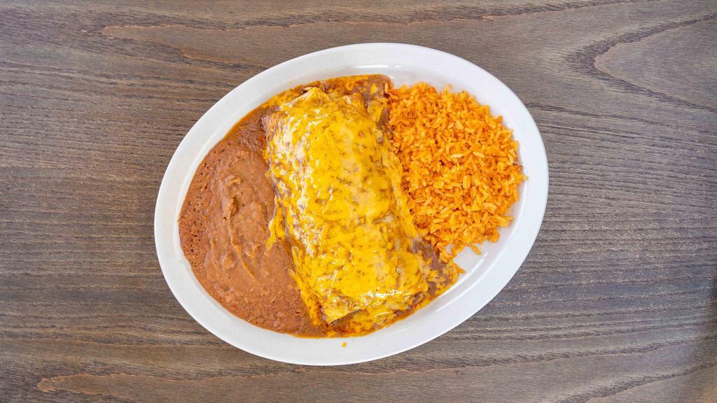Burrito Jalisco · Big burrito topped with cheese and gravy filled with your choice of meat, lettuce, tomato, avocado, and sour cream.