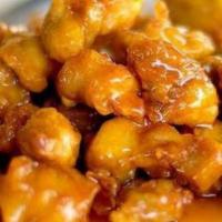 Orange Chicken · Spicy. Big chunks of chicken lightly breaded, fried until crispy, cooked in a spicy orange f...