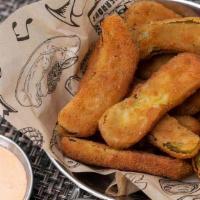 Bavarian Fried Pickles · Baby dill pickles cut length wise, lightly breaded and lightly fried. Served with a side of ...