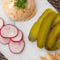 Liptauer Cheese Spread · Our delicious homemade spread is a blend of cream cheese, pickles, onions and paprika and se...