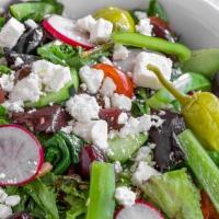 Greek Salad · This classic salad features fresh Romaine lettuce along with other mixed greens and grape to...