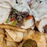 Cheesesteak · Thinly sliced steak or grilled chicken combined with grilled sweet onion and pepper mix, cre...