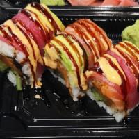 Samurai Roll · Spicy salmon, cucumber wrapped with salmon tuna and avocado. Drizzled with eel sauce and spi...