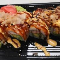 Yammy Yammy Roll · Imitation crab, avocado, cucumber, cream cheese wrapped with salmon on top. Drizzled with ee...