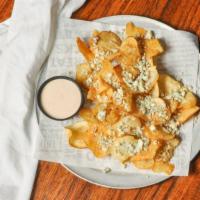 Buff Chips · Topped with bleu cheese crumbles & southwest ranch for dipping. Make them saucy and get them...