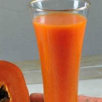 Papaya Energy Smoothie · Pineapple, papaya, lime juice, lime, papaya, ginger, almond milk