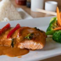 Salmon Panang · Spicy.  Grilled salmon topped with panang curry sauce, basil leaves, bell peppers, broccoli,...