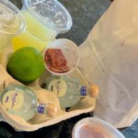 Two Pack Rita · Tequila, 16oz Chapala Margarita Mix, Limes, Chile-Salt + Chips and Salsa