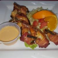 Camarones Diablo · 6 large shrimp, stuffed with Monterrey jack cheese, and jalapeño, wrapped in bacon.