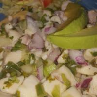 Tostada De Ceviche La Paz · Choose from shrimp or ceviche de pescado, baja style, cooked with fresh lime juice, tomato, ...