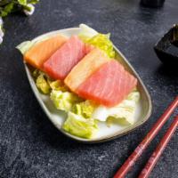 Smoked Salmon Sashimi · Six pieces of smoked salmon sashimi.